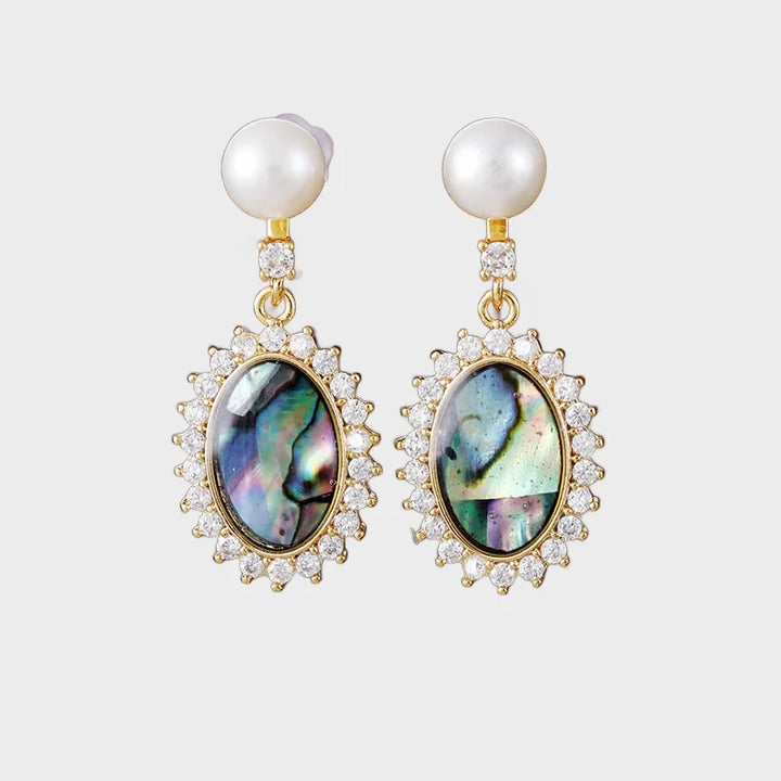 עגילי “הילה של ים” – פניני מים מתוקים וצדף אירידסנטי