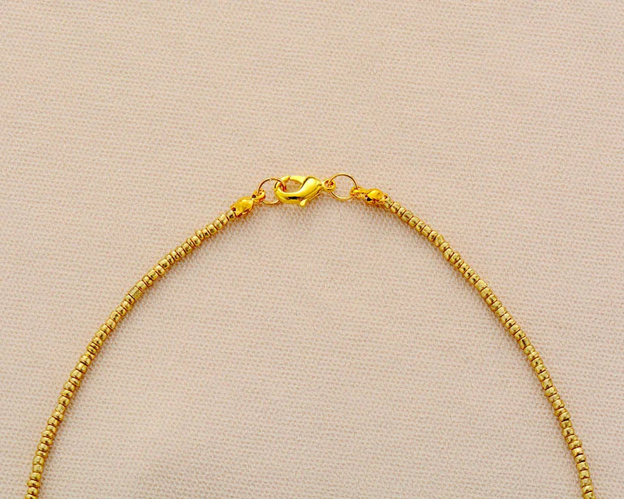 קולר “טיפות טורקיז” – שרשרת חרוזים קצרה בסגנון בוהו